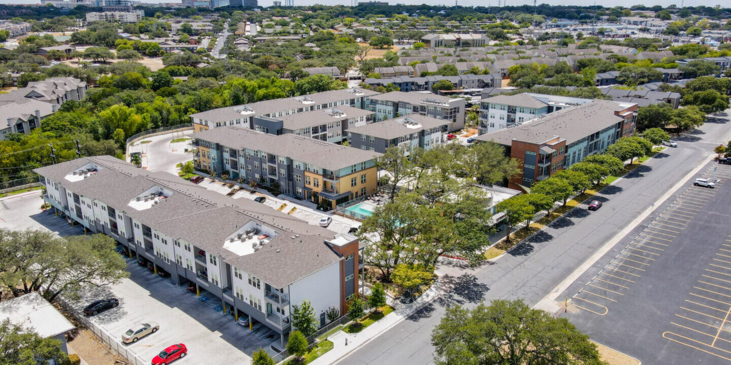 An aerial view of a residential area with many buildings.